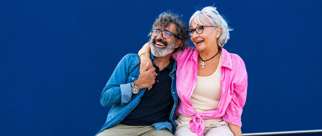 mature couple sitting outside
